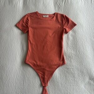 Aritzia Original Contour Crew Bodysuit in Coral Pink